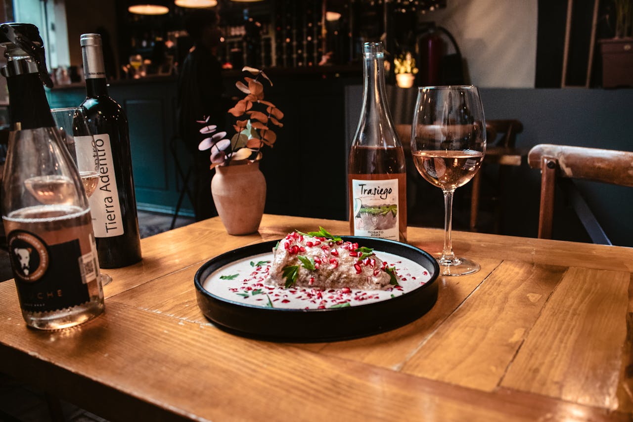 Delightful gourmet dining experience with wine and decor in a stylish restaurant setting.